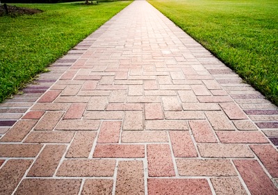 Brick vs. Concrete Pavers: Helpful Maintenance Tips for Each